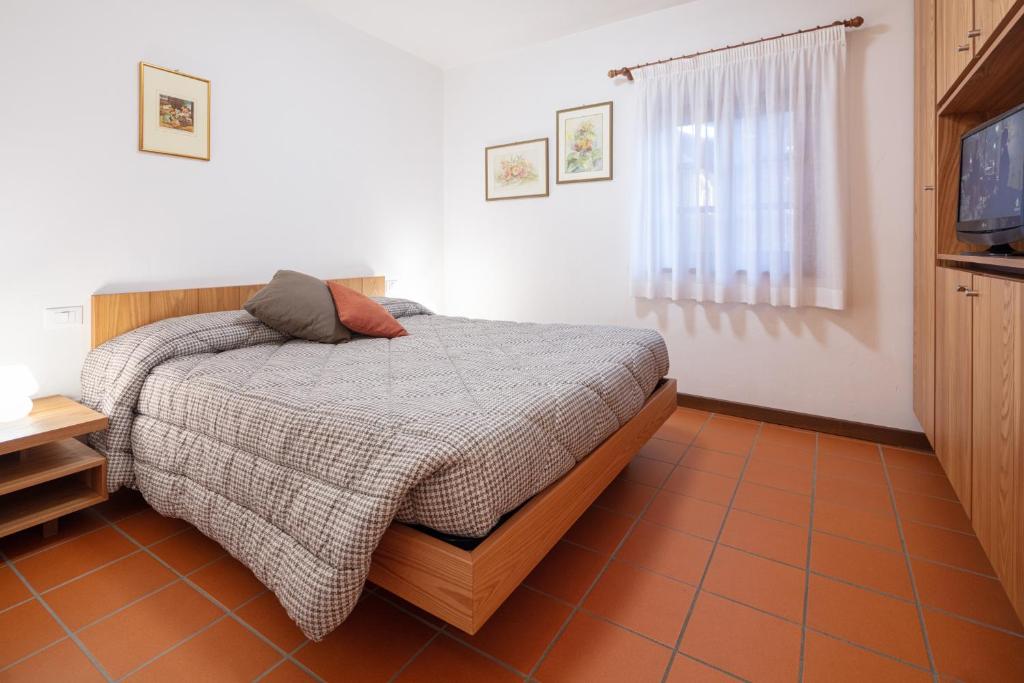 Letto o letti in una camera di Agriturismo I Comelli
