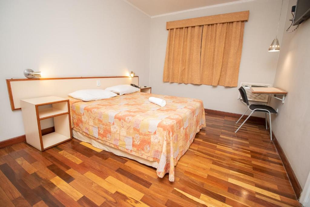 Postel nebo postele na pokoji v ubytování Hotel Bramig