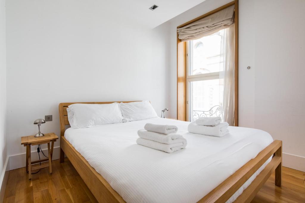 Postel nebo postele na pokoji v ubytování Soulful Central London Apartment