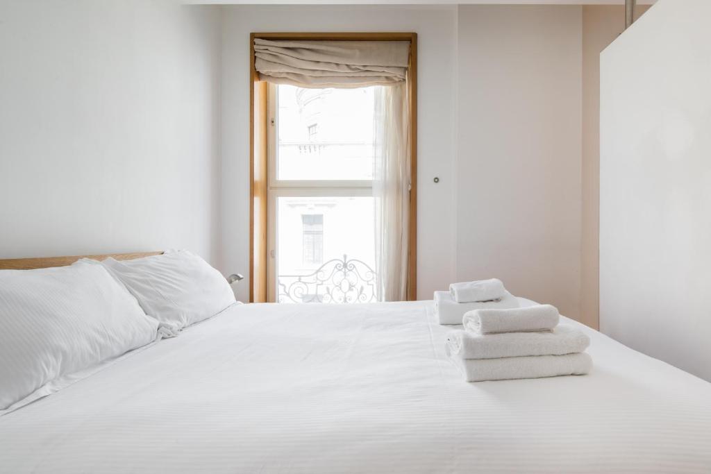 Postel nebo postele na pokoji v ubytování Soulful Central London Apartment
