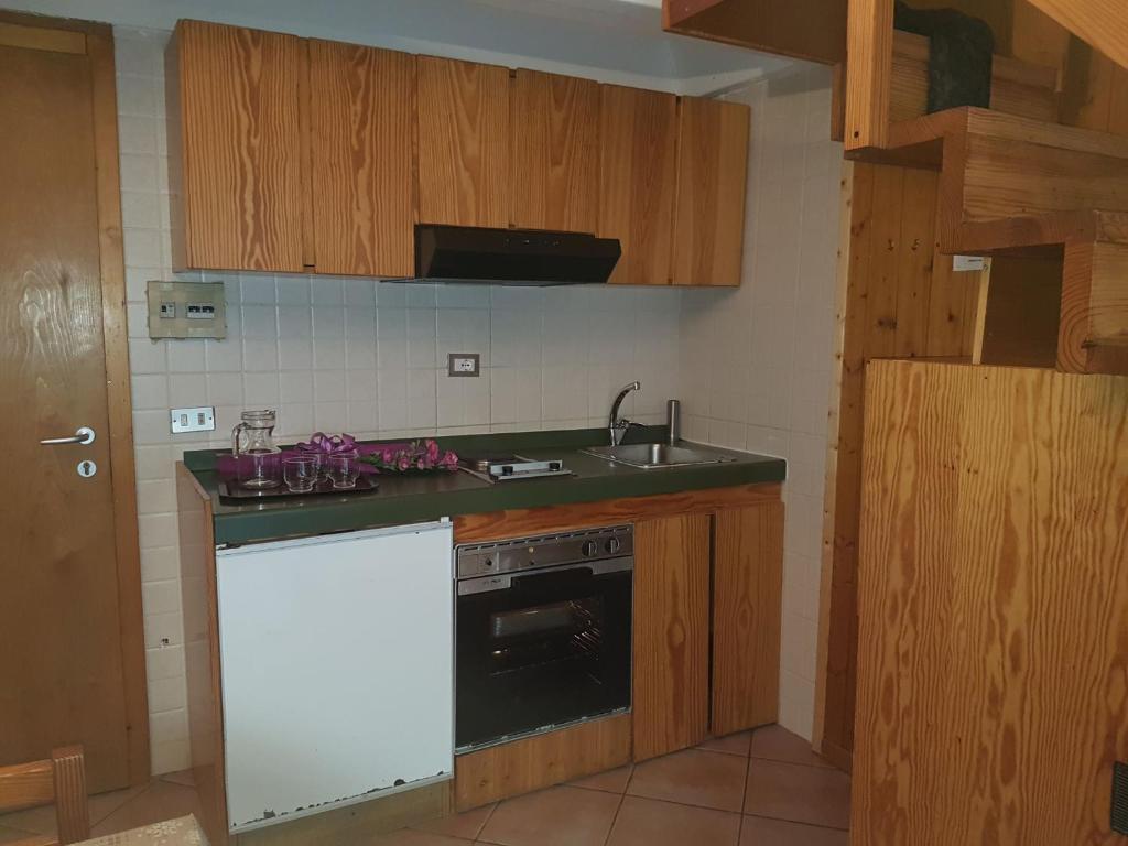 Kuchyň nebo kuchyňský kout v ubytování Res. Sole Alto appartamenti Solandra
