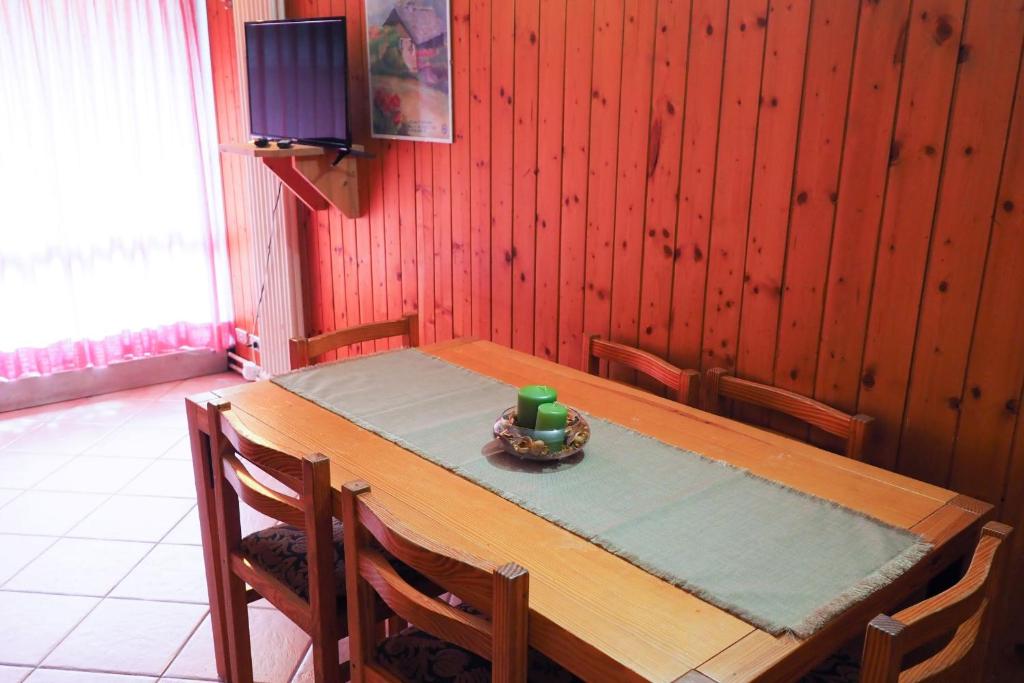 TV a/nebo společenská místnost v ubytování Res. Sole Alto appartamenti Solandra