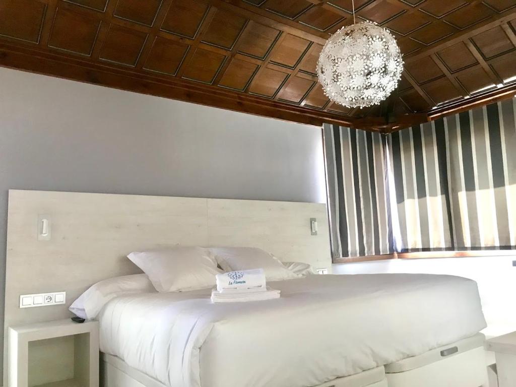 Postel nebo postele na pokoji v ubytování Palacio La Floresta