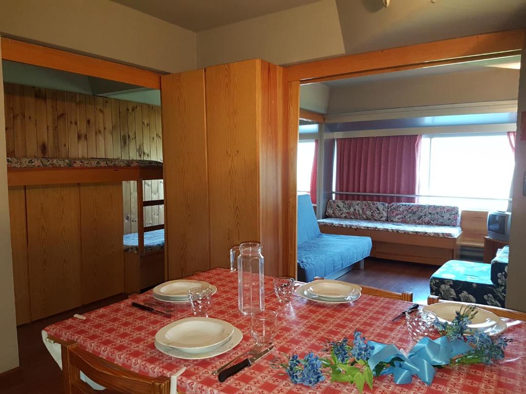 Postel nebo postele na pokoji v ubytování Res. Sole Alto appartamenti Solandra