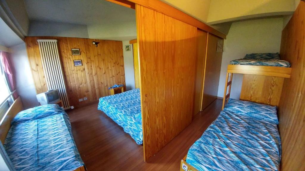 Postel nebo postele na pokoji v ubytování Res. Sole Alto appartamenti Solandra