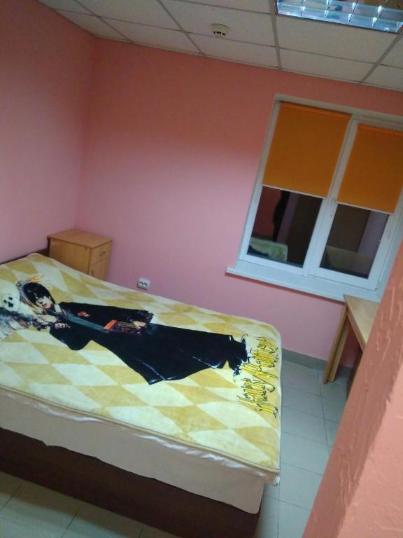 Postel nebo postele na pokoji v ubytování У Поттера