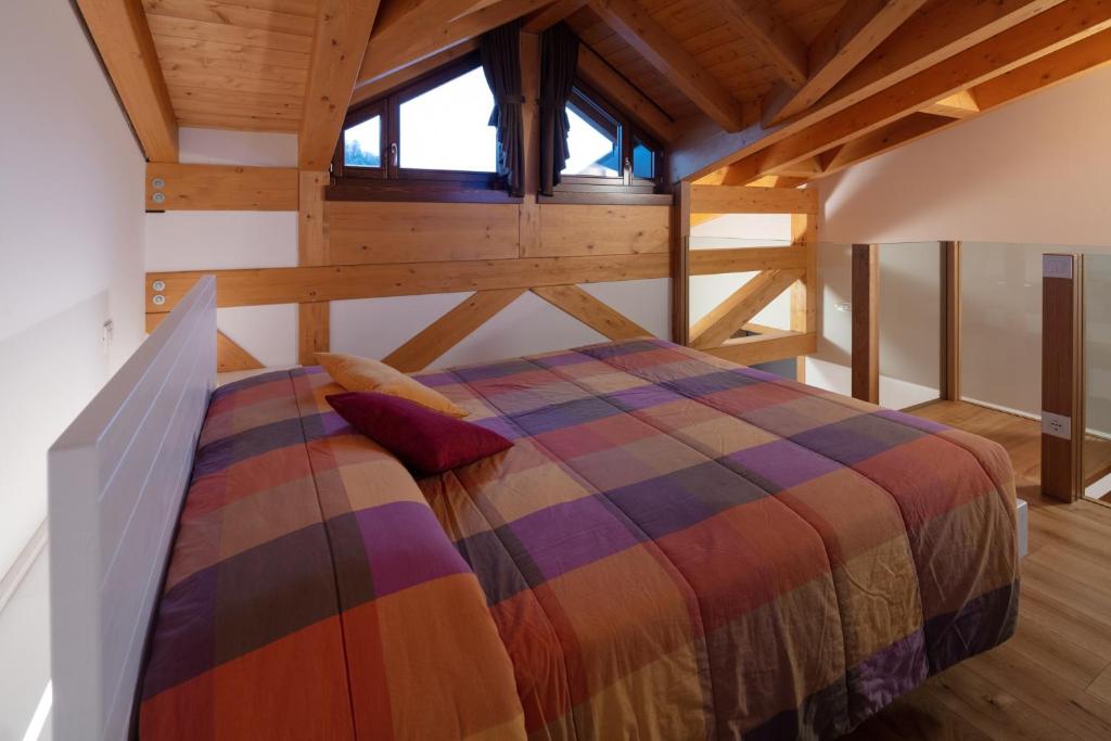 Letto o letti in una camera di Agriturismo I Comelli