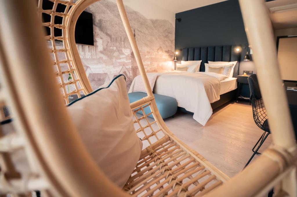 Postel nebo postele na pokoji v ubytování Hotel & Spa Suiten FreiWerk
