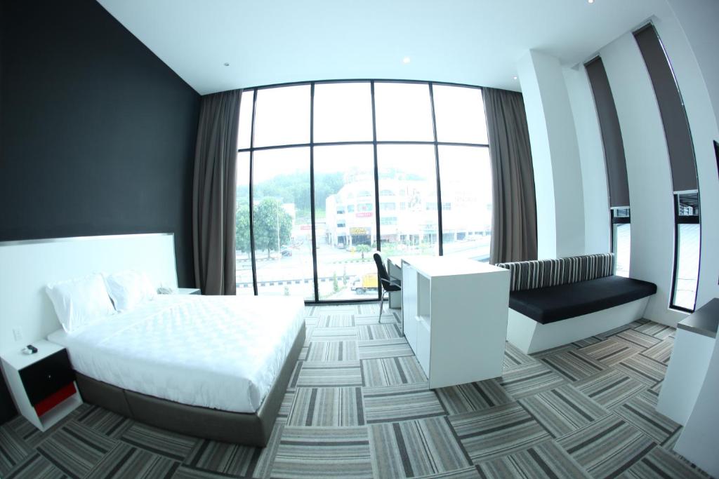 Postel nebo postele na pokoji v ubytování Beverly Hotel
