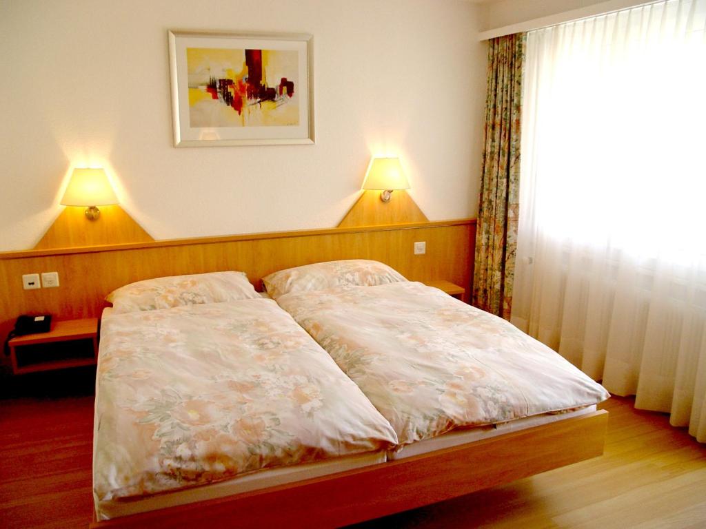 Postel nebo postele na pokoji v ubytování Hotel Eden No. 7