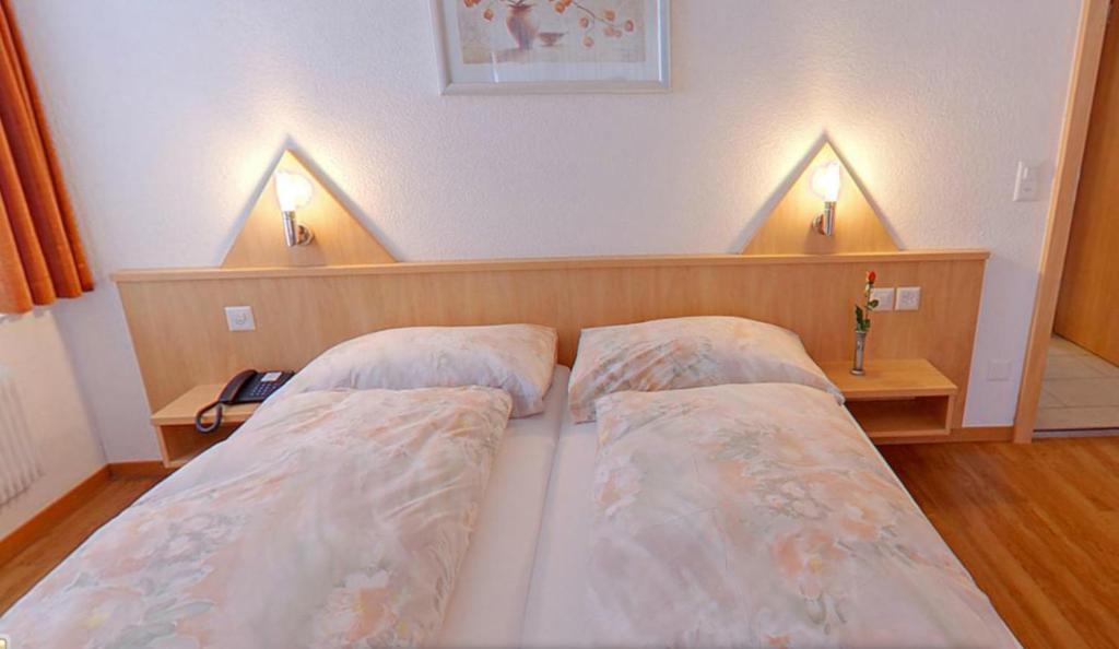 Postel nebo postele na pokoji v ubytování Hotel Eden No. 7