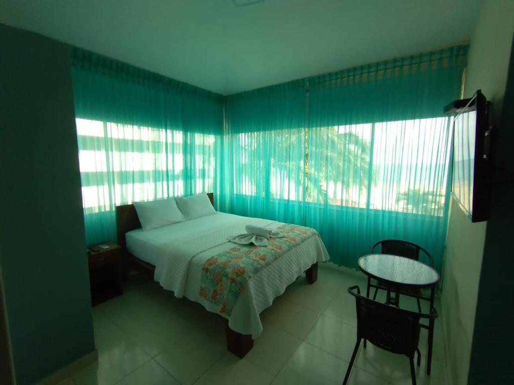 Postel nebo postele na pokoji v ubytování Hotel Casablanca CHIPIPE