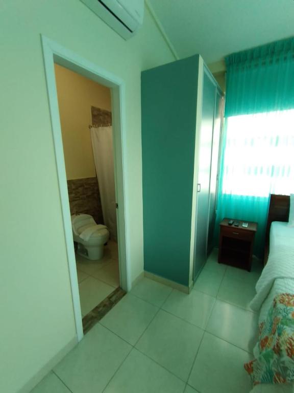 Postel nebo postele na pokoji v ubytování Hotel Casablanca CHIPIPE
