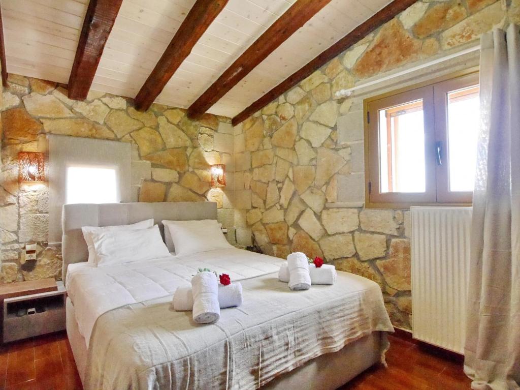 Postel nebo postele na pokoji v ubytování Villa Vangelis Stylos Crete