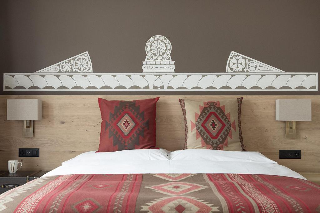 Postel nebo postele na pokoji v ubytování Hotel Steffani