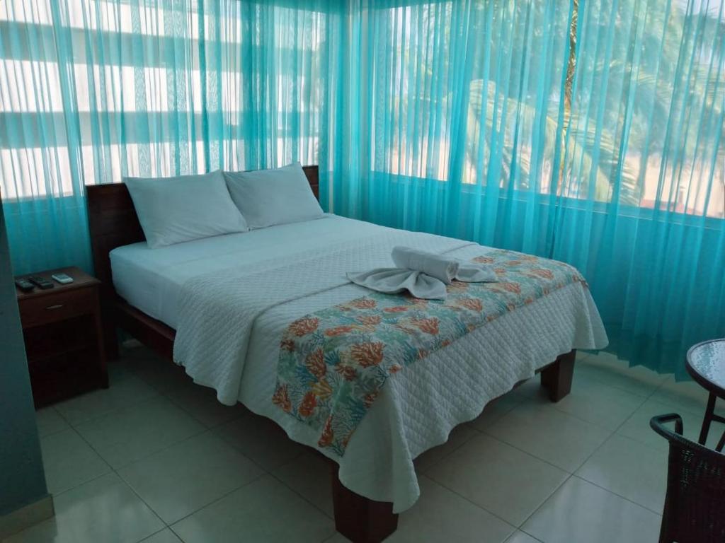 Postel nebo postele na pokoji v ubytování Hotel Casablanca CHIPIPE