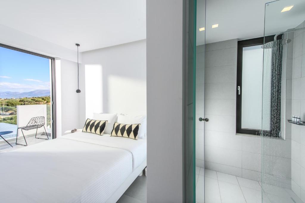 Postel nebo postele na pokoji v ubytování Cocoon Luxury Villas