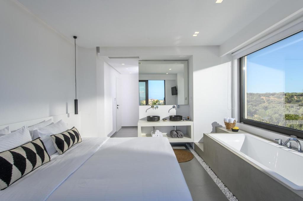 Postel nebo postele na pokoji v ubytování Cocoon Luxury Villas