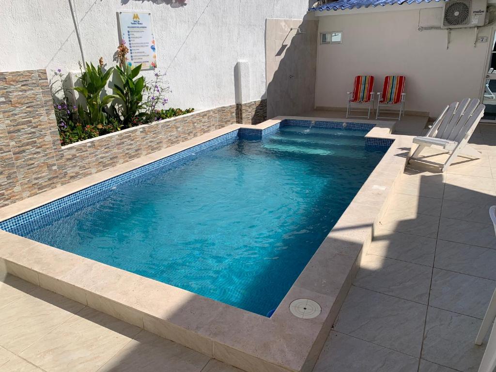 Bazén v ubytování Mar de Indias House nebo v jeho okolí