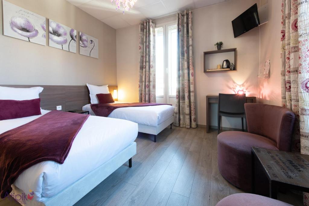 Postel nebo postele na pokoji v ubytování Atipik Hôtel