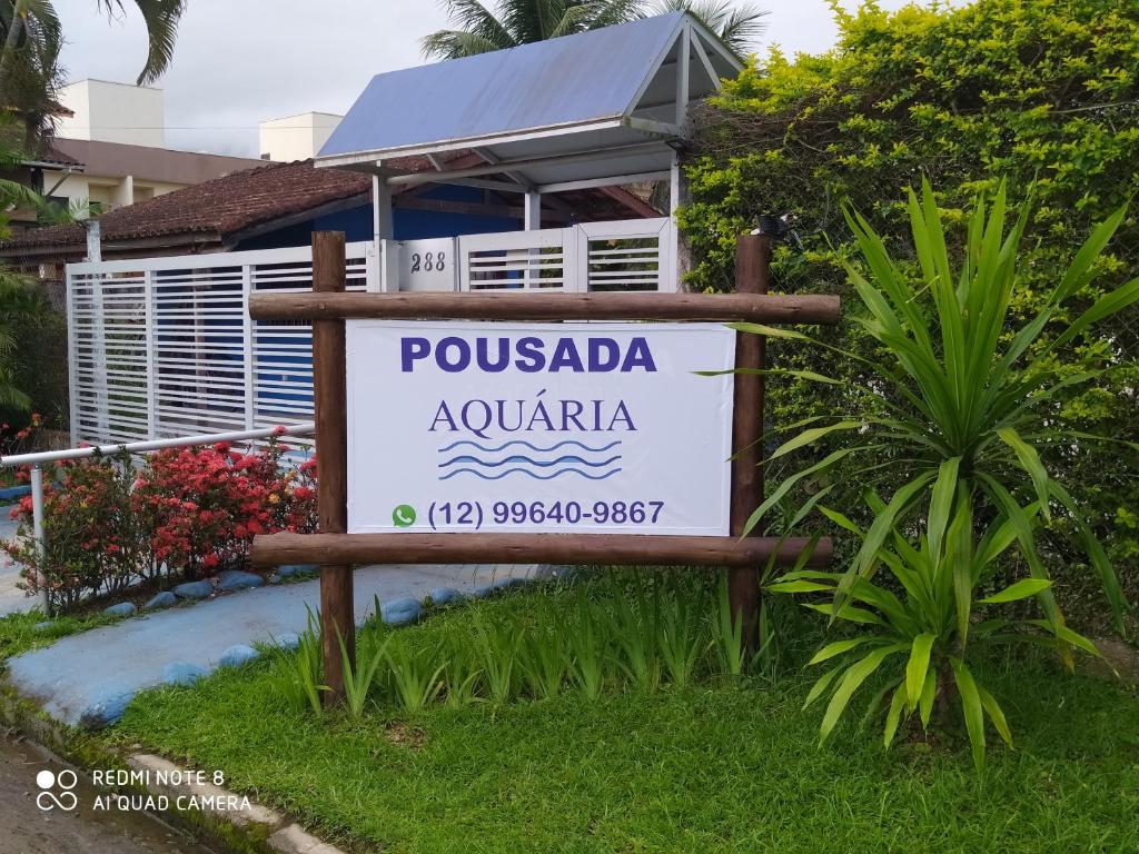 Um certificado, prêmio, placa ou outro documento exibido em Pousada Aquaria