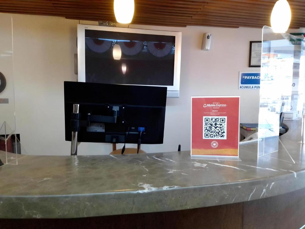 TV a/nebo společenská místnost v ubytování Mision Express Pachuca