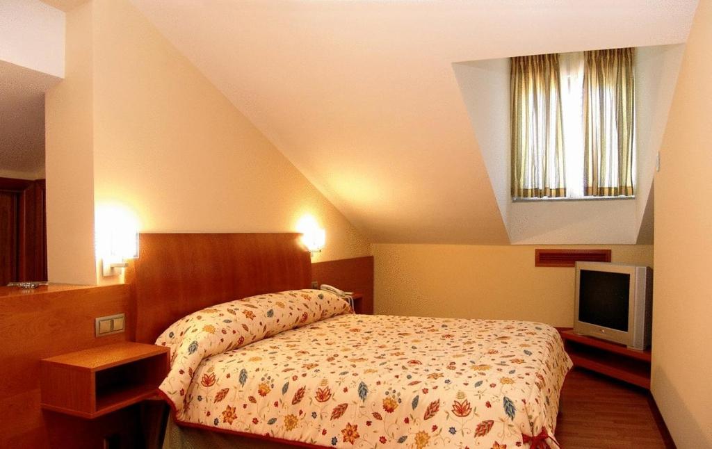 Postel nebo postele na pokoji v ubytování Complejo El Carrascal