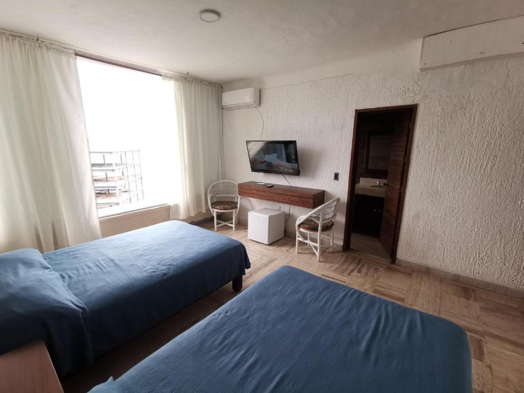 62 ROOM PENINSULA CAPITAN