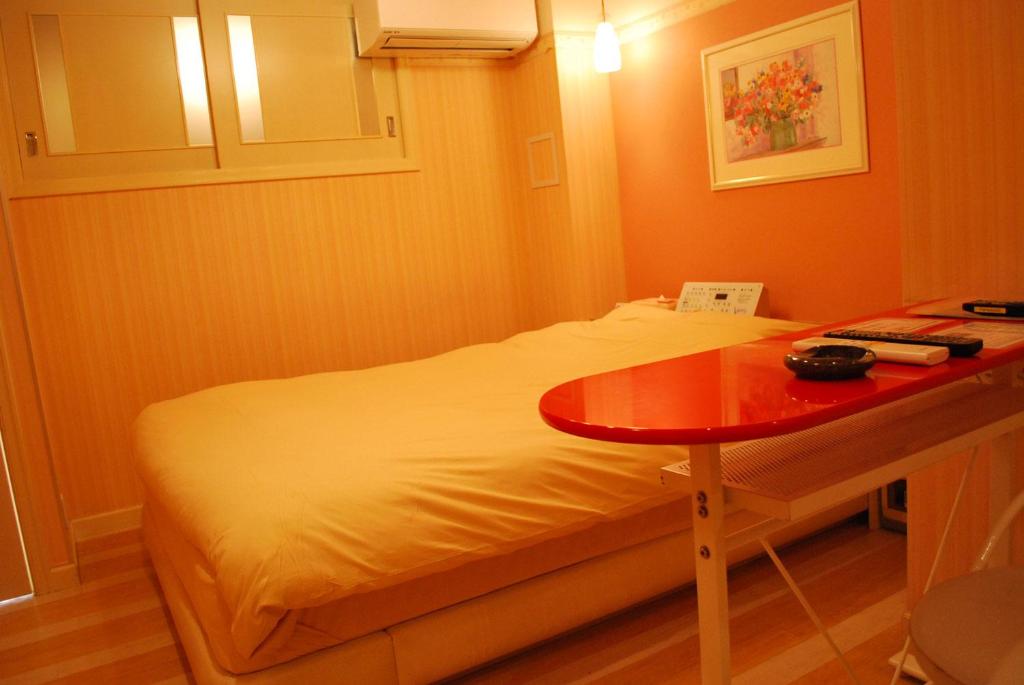 Postel nebo postele na pokoji v ubytování Ena Hotel Venus