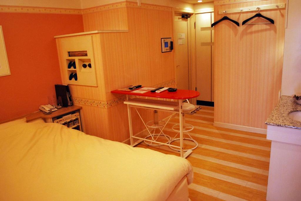 Postel nebo postele na pokoji v ubytování Ena Hotel Venus