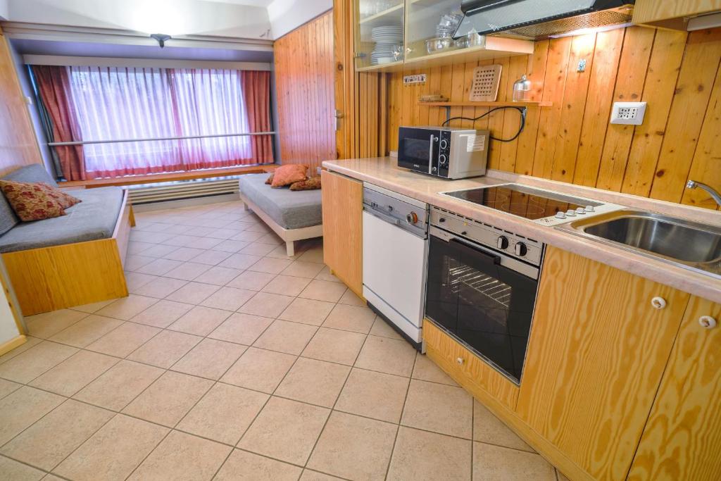Kuchyň nebo kuchyňský kout v ubytování Res. Sole Alto appartamenti Solandra