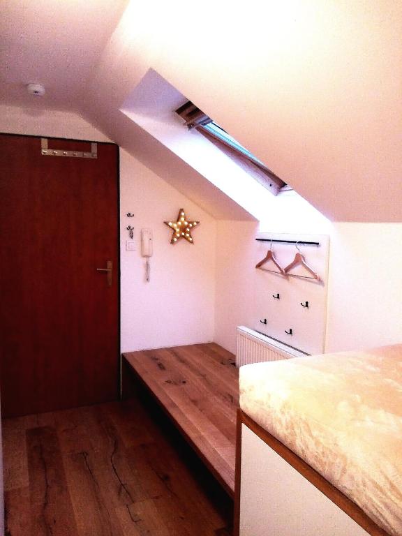Postel nebo postele na pokoji v ubytování Brunetti Apartmány Jeseníky