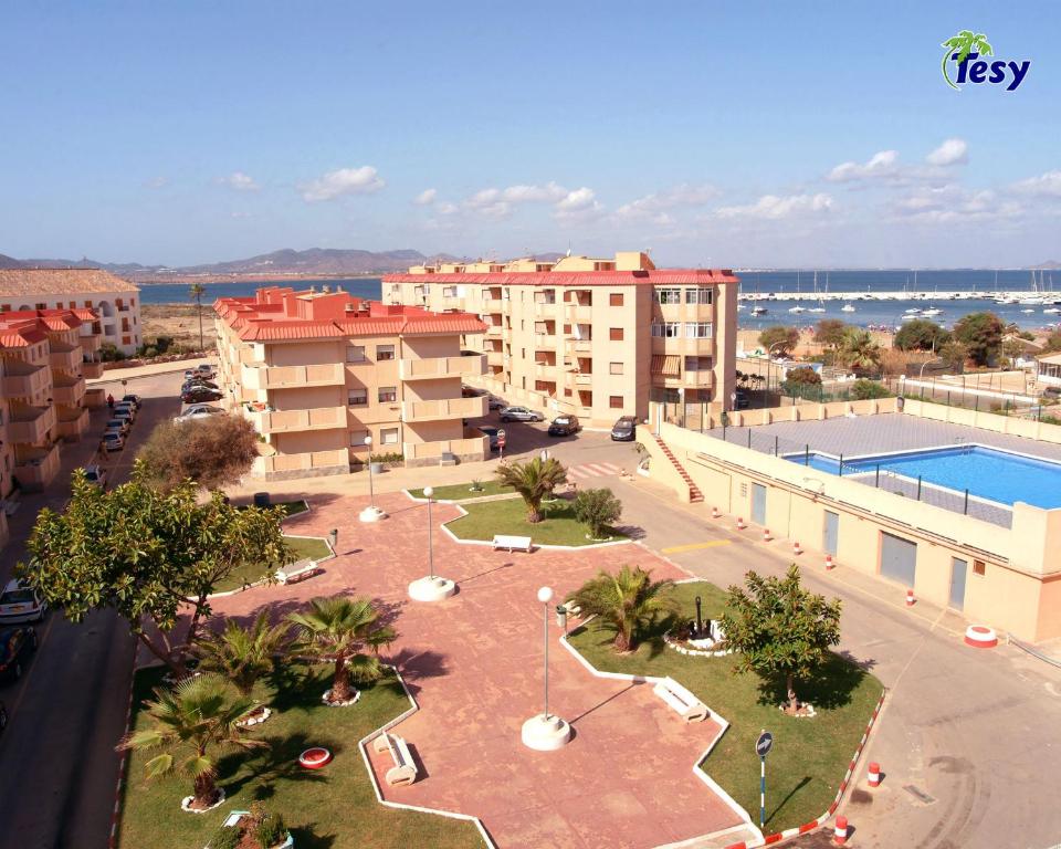 Bazén v ubytování Apartamentos Tesy nebo v jeho okolí