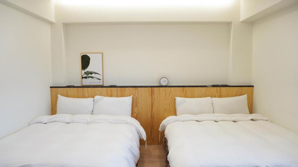 Llit o llits en una habitació de Su Ao Hotel