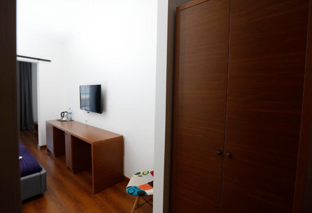 TV a/nebo společenská místnost v ubytování Hotel Homey Kobuleti