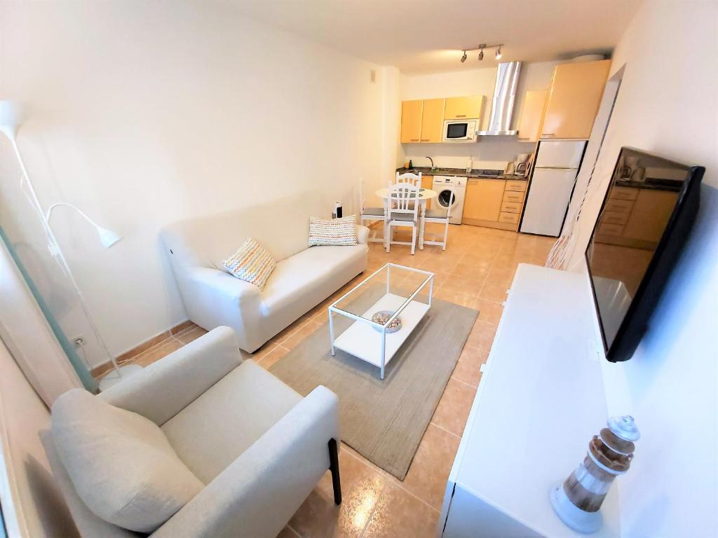 Kuchyň nebo kuchyňský kout v ubytování Apartamentos Sarah