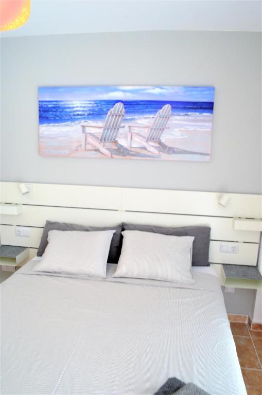 Postel nebo postele na pokoji v ubytování Apartamentos Sarah