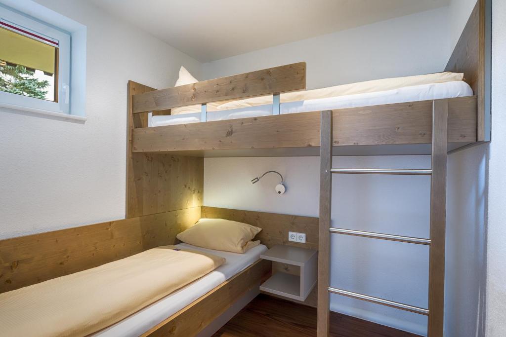 Postel nebo postele na pokoji v ubytování Hotel Zum Löwen - Unteres Wirtshaus