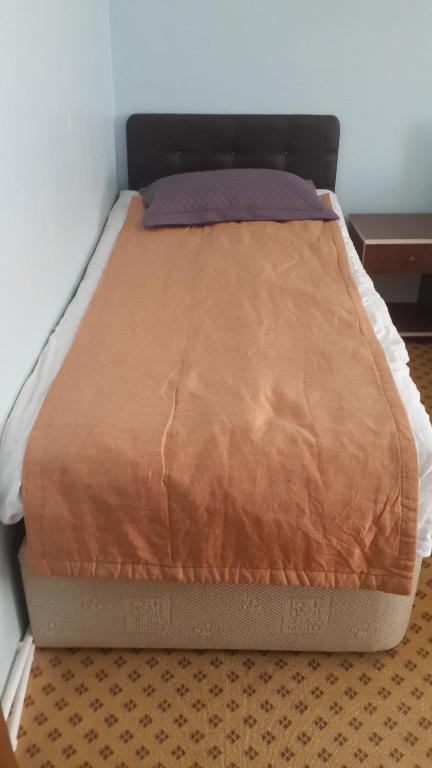 Postel nebo postele na pokoji v ubytování Esin Pansiyon