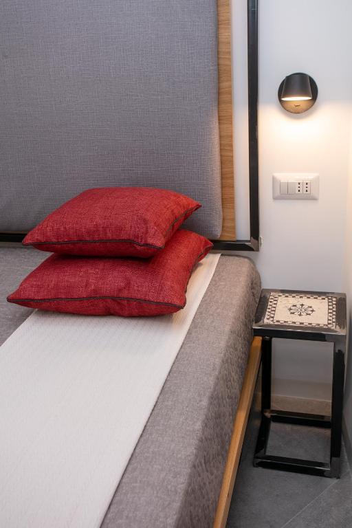 Postel nebo postele na pokoji v ubytování Bellamania B&B