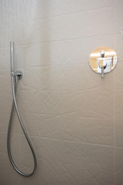 Koupelna v ubytování Bellamania B&B