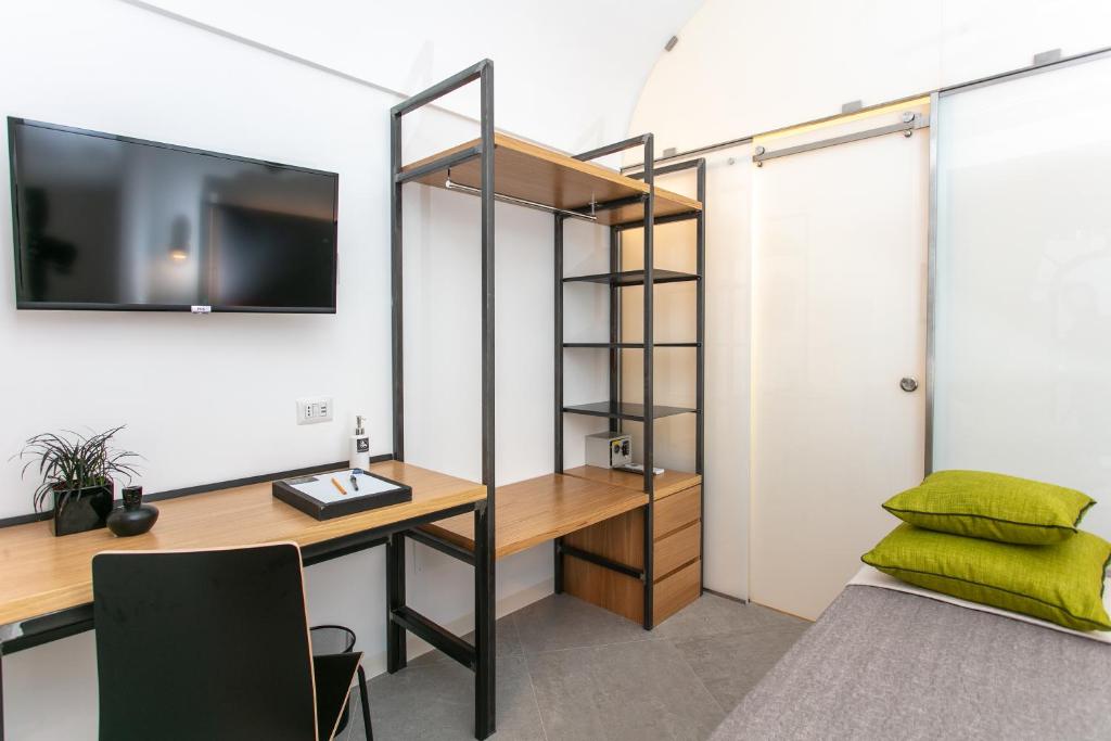 TV a/nebo společenská místnost v ubytování Bellamania B&B