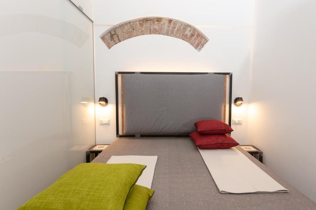 Postel nebo postele na pokoji v ubytování Bellamania B&B