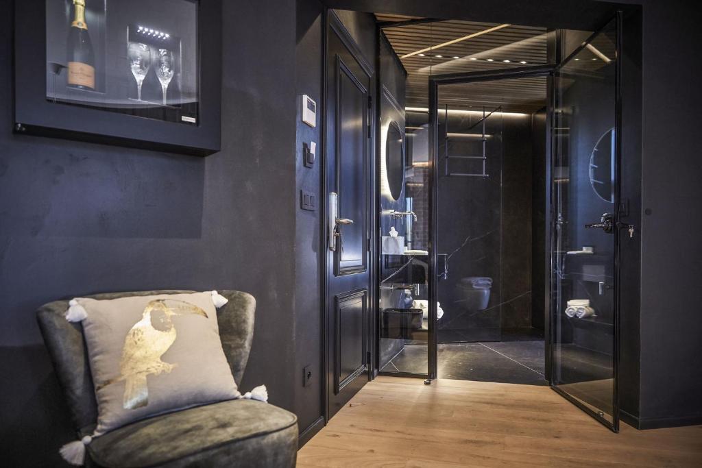 Posezení v ubytování Hotel ONIRO - Luxury Rooms & Wellness Suites