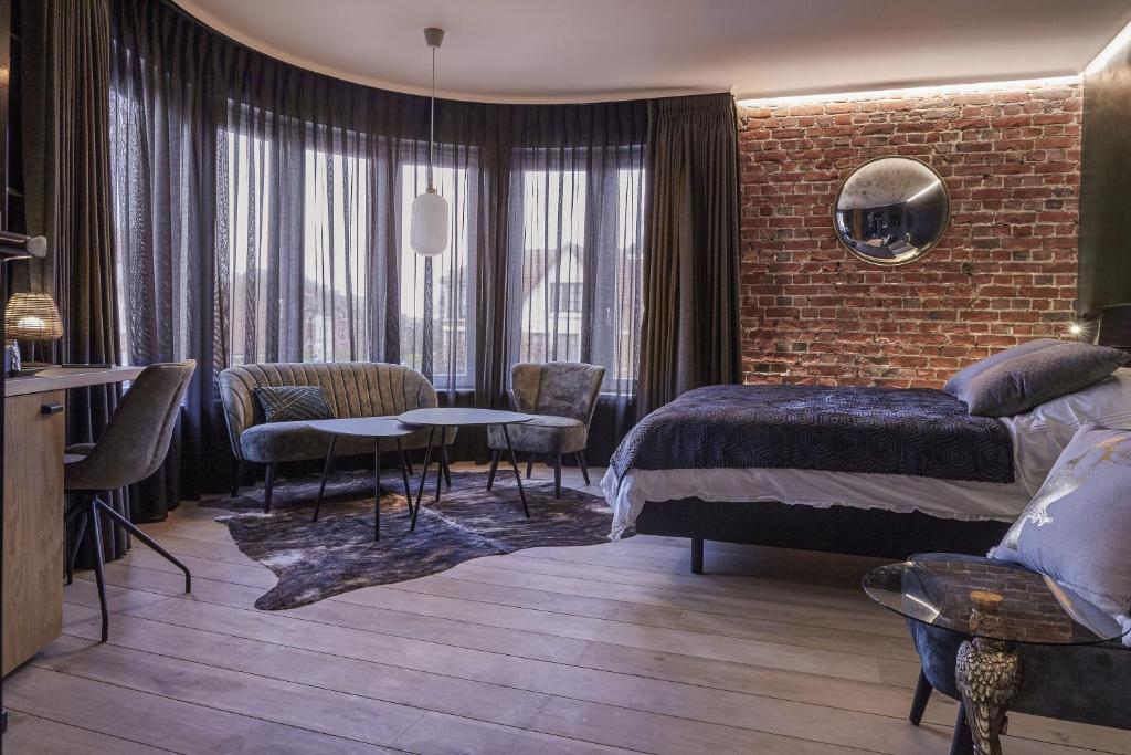 Postel nebo postele na pokoji v ubytování Hotel ONIRO - Luxury Rooms & Wellness Suites