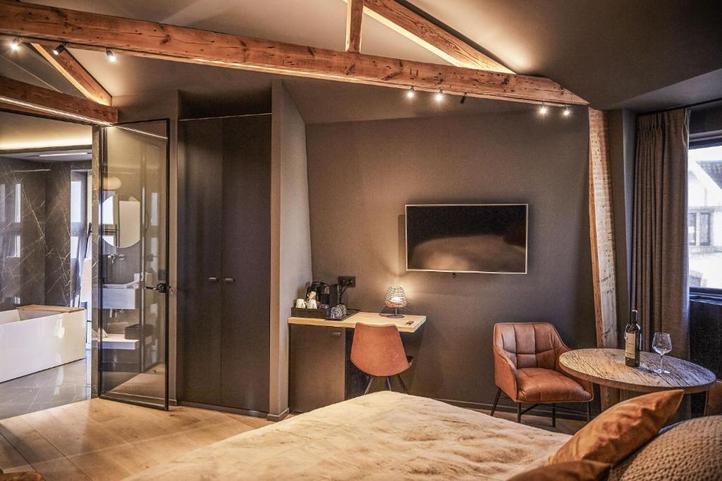 Postel nebo postele na pokoji v ubytování Hotel ONIRO - Luxury Rooms & Wellness Suites