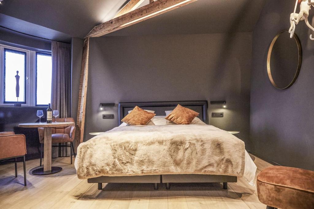 Postel nebo postele na pokoji v ubytování Hotel ONIRO - Luxury Rooms & Wellness Suites