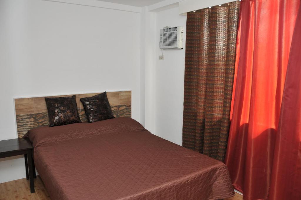 Postel nebo postele na pokoji v ubytování Date & Dine Resort