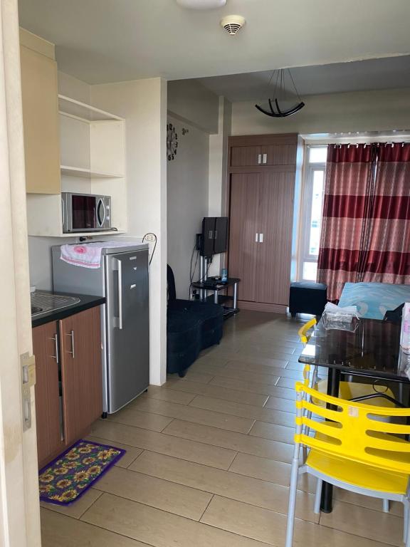 Favila Condotel Unit-150 Newport Boulevard near Airport Terminal 3 and all other Airport - Studio Apartment
