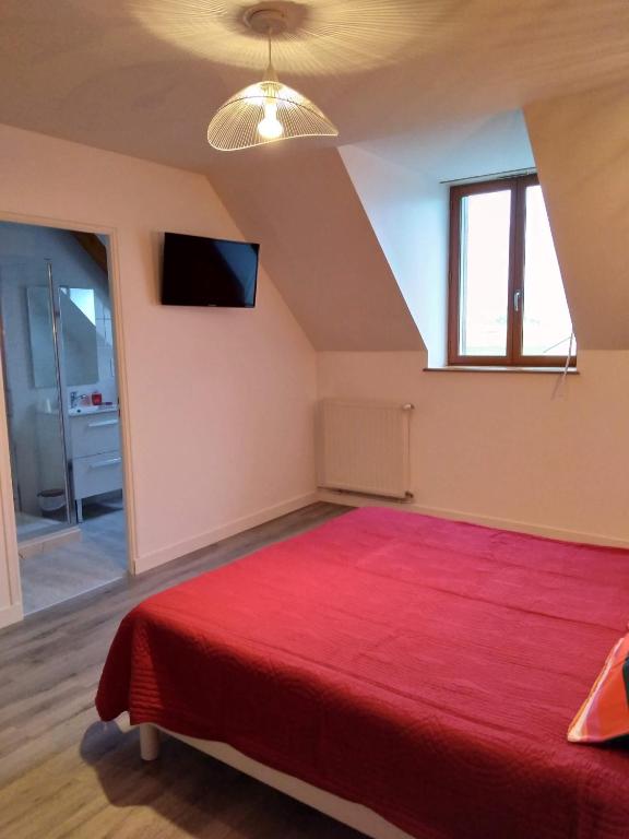Postel nebo postele na pokoji v ubytování Vent des Grèves